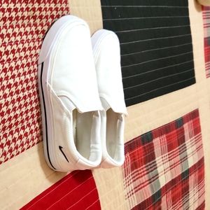 Womens Nike white slip ons, size 8